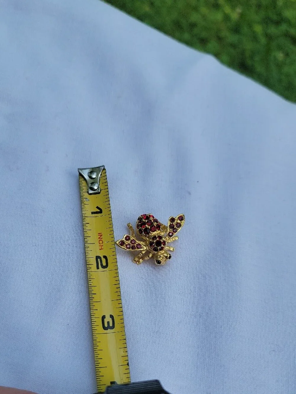 Vintage Joan Rivers Gold Bee Brooch with Red Crystals